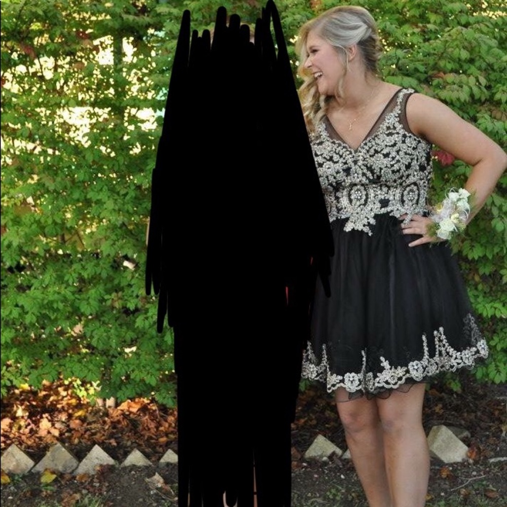 Black dress with gold designs from Promgirl